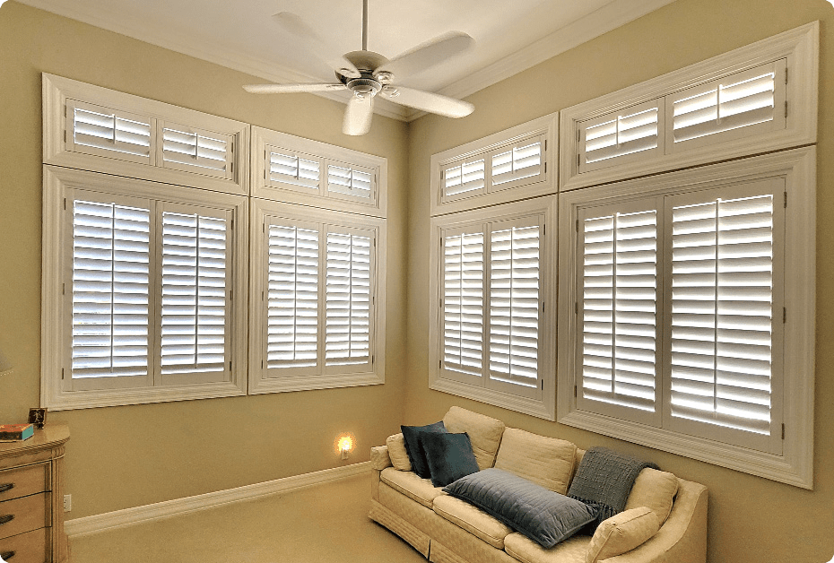 corner windows with wood shutters